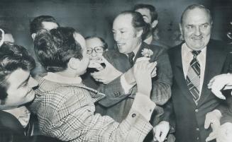 Prime Minister Pierre Trudeau receives greetings from well wishers after officially opening new Hall of Federation of Italian Canadian Associations on(...)